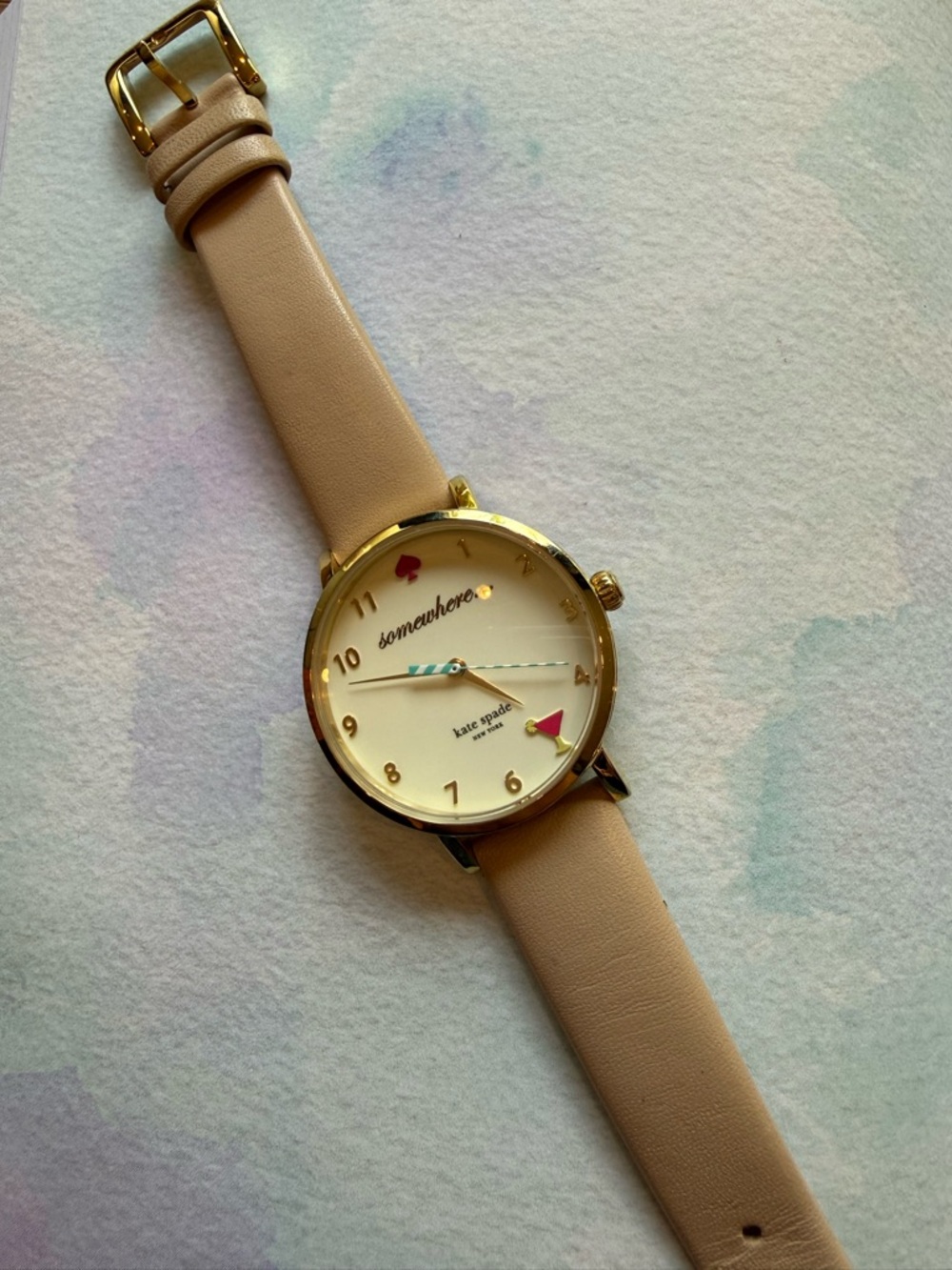 kate spade Gold Tone “It’s 5:00 somewhere” Watch with Cream Dial and Beige Strap